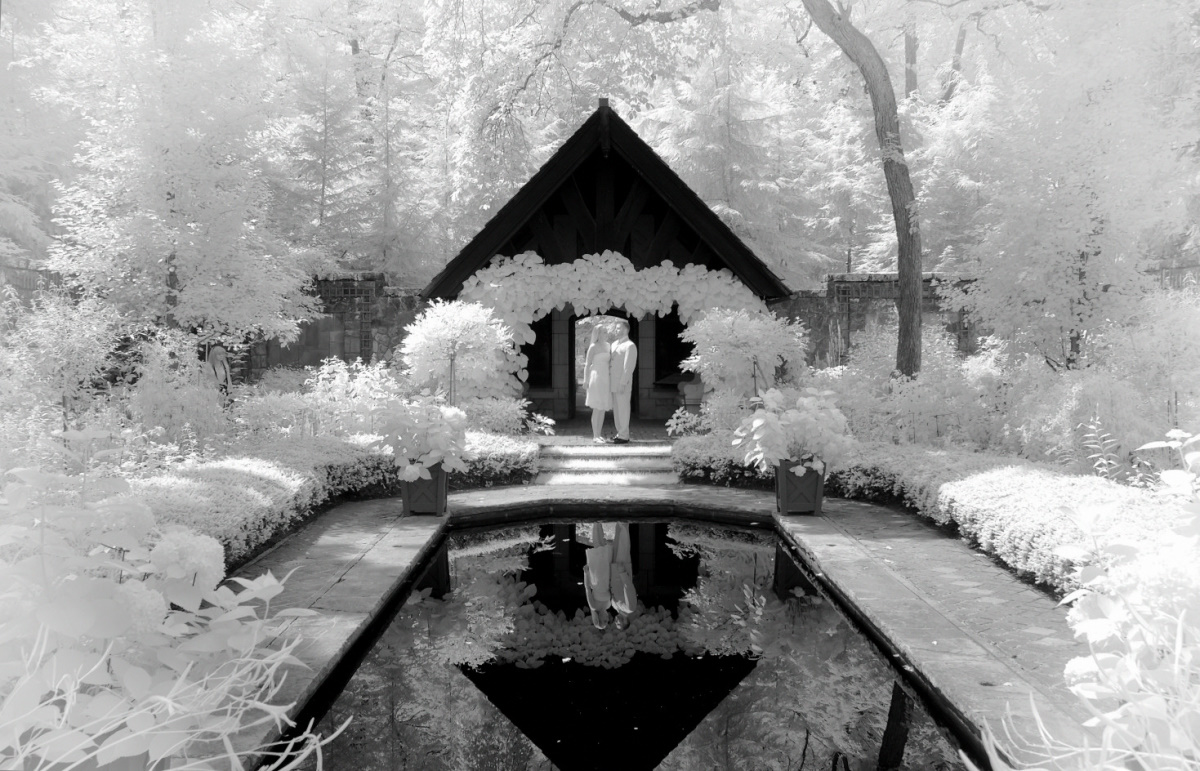 A couple in a beautiful garden (infrared). Akron, Ohio, USA. Photo by Dick Pratt