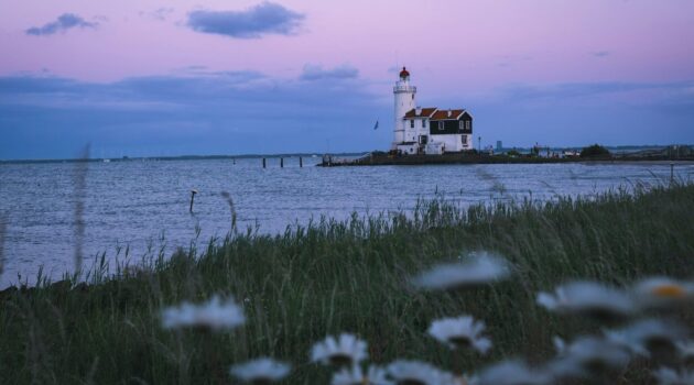 A lighthouse in Marken, Netherlands. Photo by Artem Shuba