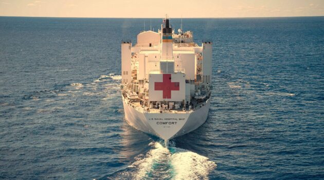 The hospital ship USNS Comfort steams through the ocean. Photo by Navy Medicine (U.S. Navy photo by Mass Communication Specialist 1st Class Donald R. White Jr.)