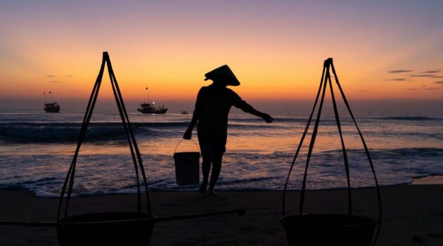 Preparing for the night’s catch to arrive as the sun rises. Duy Nghia, Duy Nghia, Vietnam. Photo by Pete Walls
