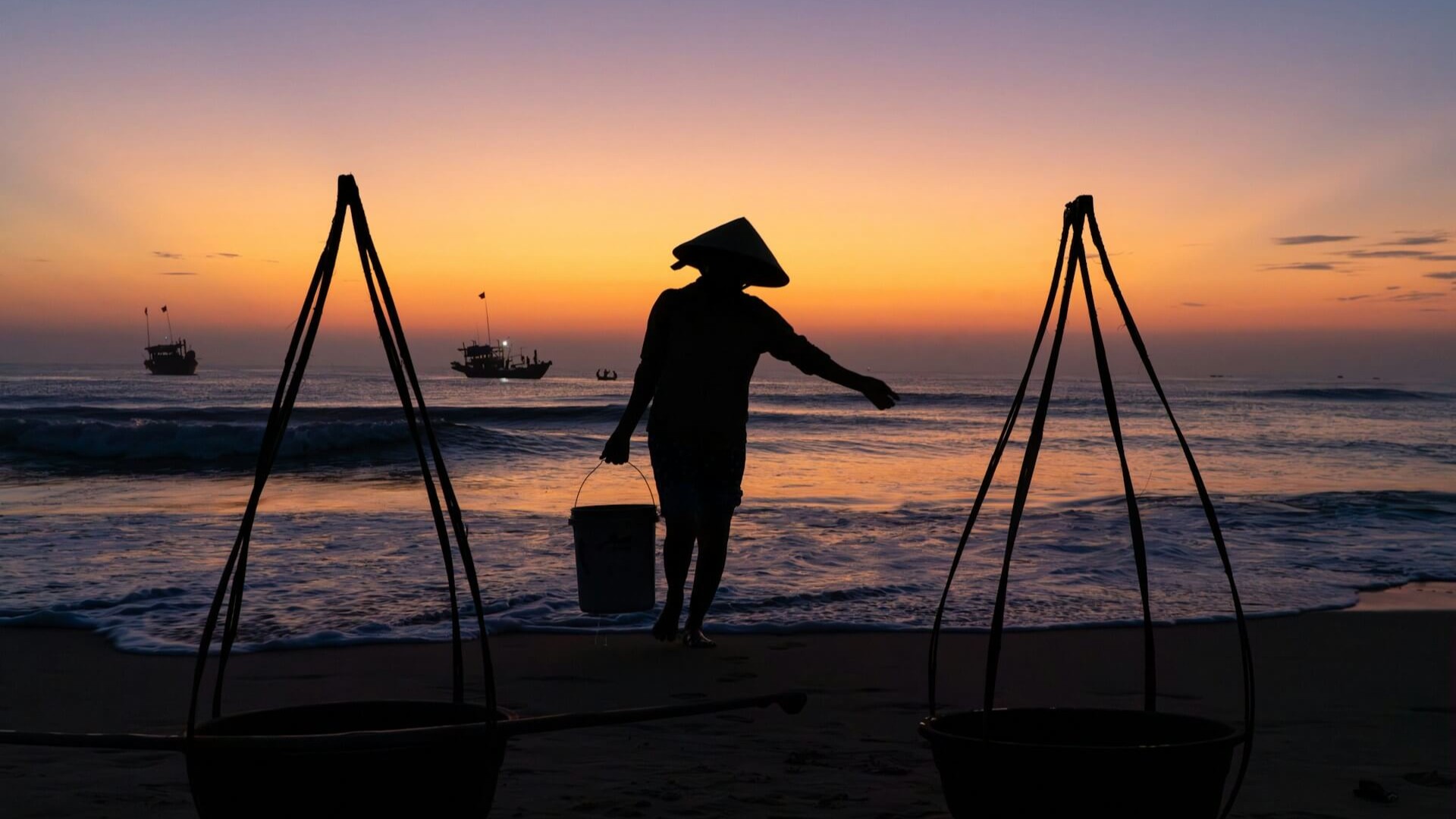Preparing for the night’s catch to arrive as the sun rises. Duy Nghia, Duy Nghia, Vietnam. Photo by Pete Walls