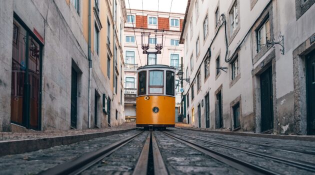 The iconic yellow Elevador da Bica (Bica Funicular) in Lisbon, Portugal. Photo by Philipp Düsel