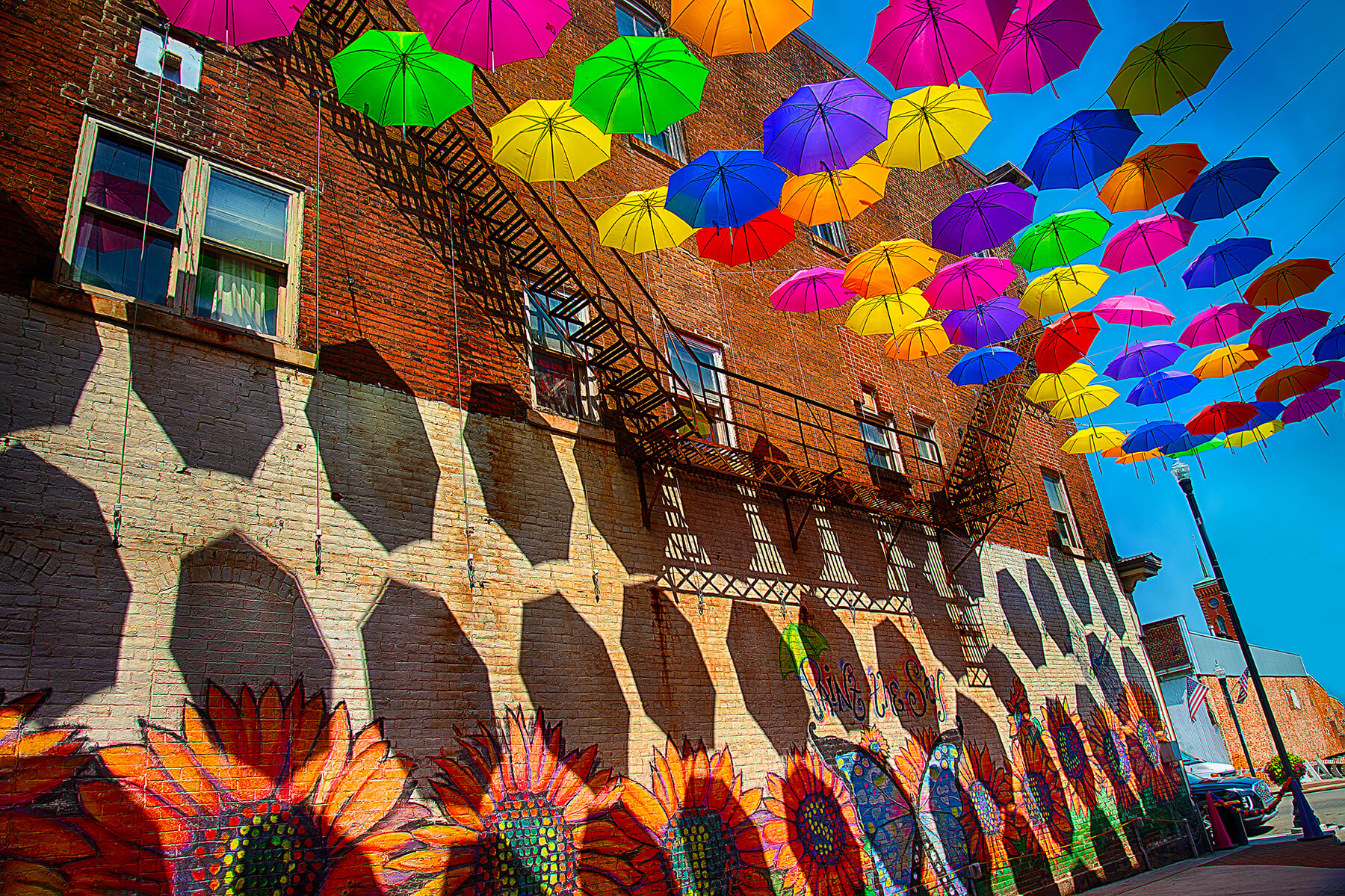 An ally of umbrellas. Louisville, Ohio, USA. Photo by Dick Pratt.