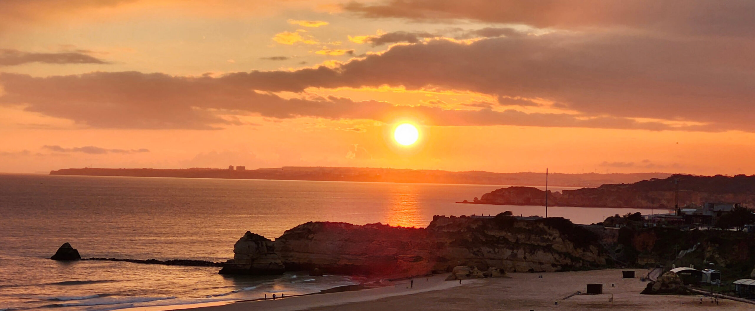 Sunset in Algarve, Portugal. Photo by Dino Di Gregorio
