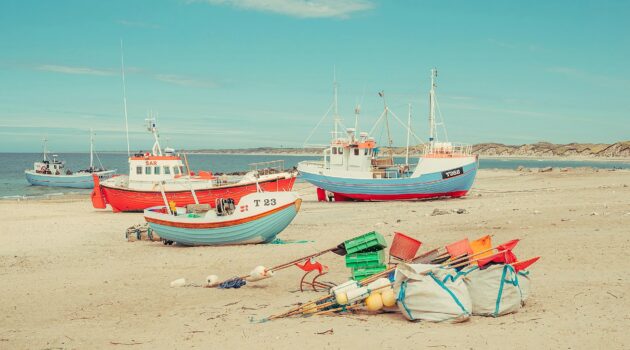 Colorful fishing boats and gear. Photo by Pascal Bullan