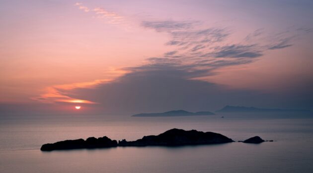 A tranquil seascape at sunset. Greece. Photo by Pascal Debrunner